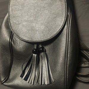 Fun and stylish backpack - more pewter than gold and all sorts of pizazz!